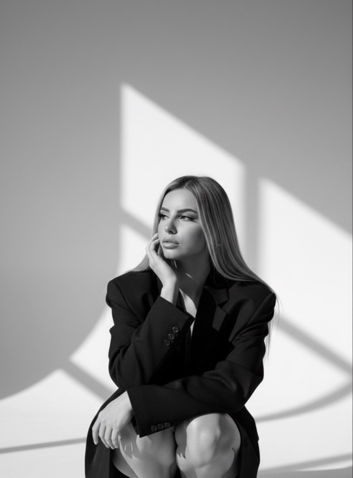 Editorial portrait of Romilda in a studio with geometric light